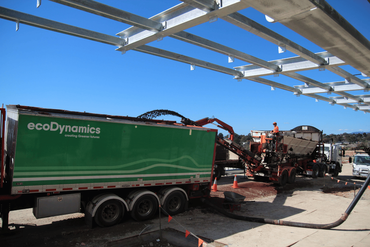 An ecoDynamics truck ready to go at a blowing landscaping project