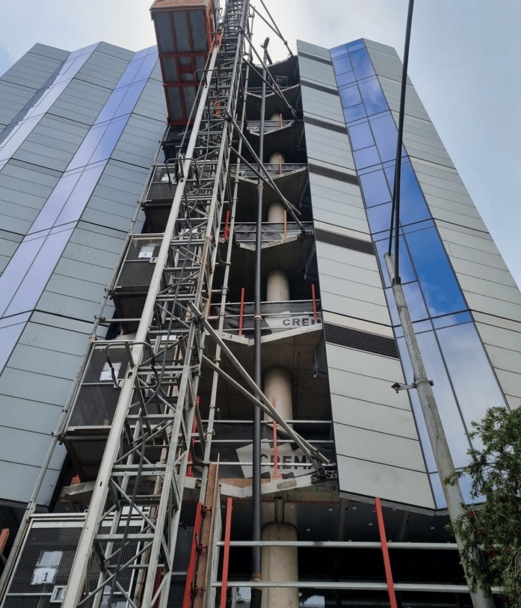 The high-rise that we got our blowing hose up to install materials
