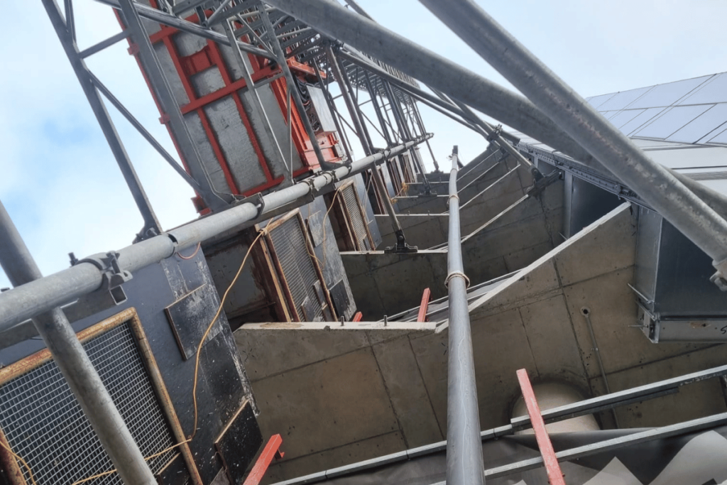 The scaffolding that the blower hose ran through so we could blow soil and aggregate